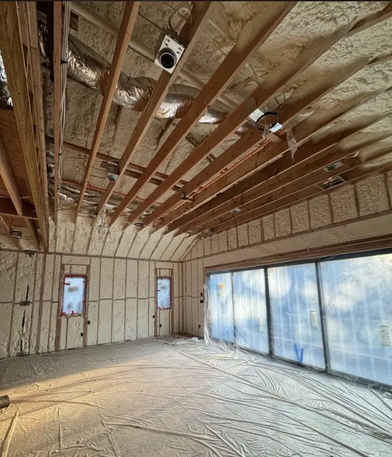 Interior walls and ceiling insulated with spray foam during new construction in Schriever